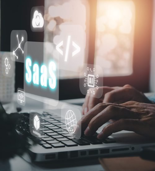 SaaS – software as a service, Businessman hand working on laptop SaaS - software as a service, Businessman hand working on laptop to synchronize on SaaS host server to working on system for technology and business concept